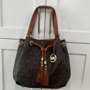 Michael Kors Brown Jet Set MK Logo Drawstring Shoulder Bag with Tassel Charm